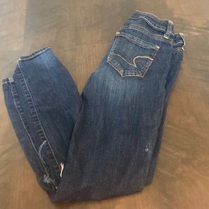 AE SKINNY distressed dark wash jeans